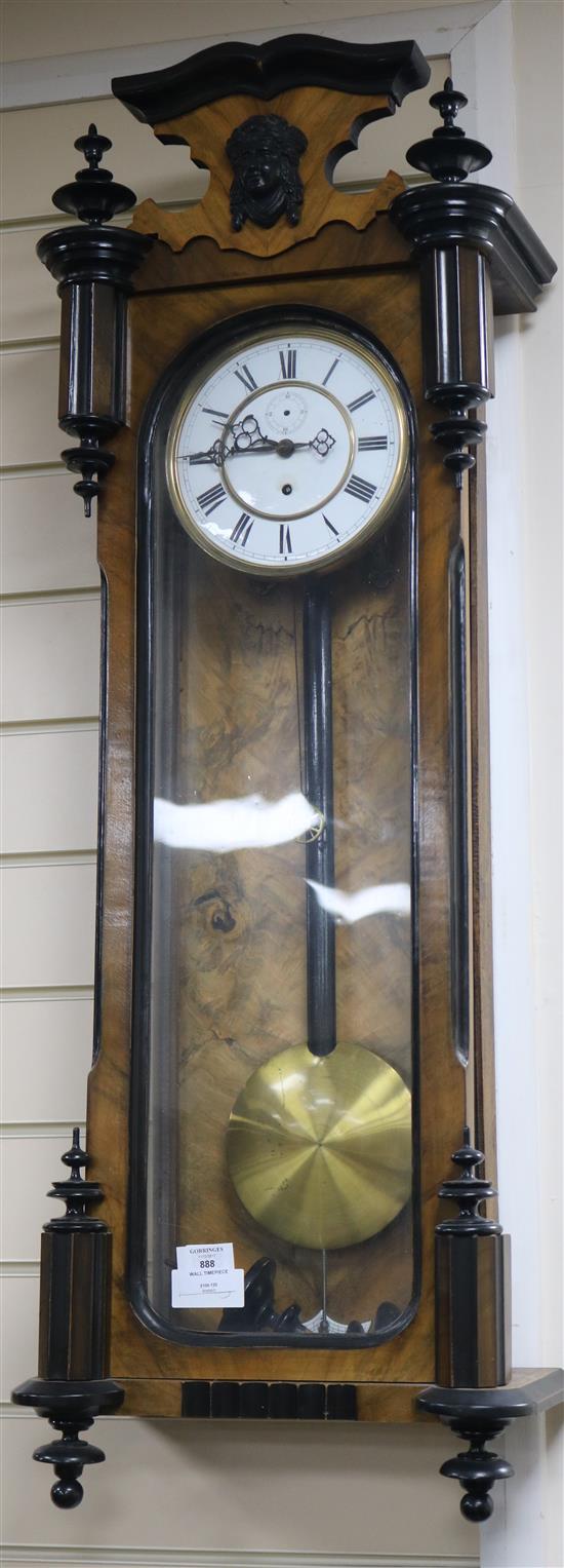 A 19th century Vienna wall timepiece, 3ft 5in.